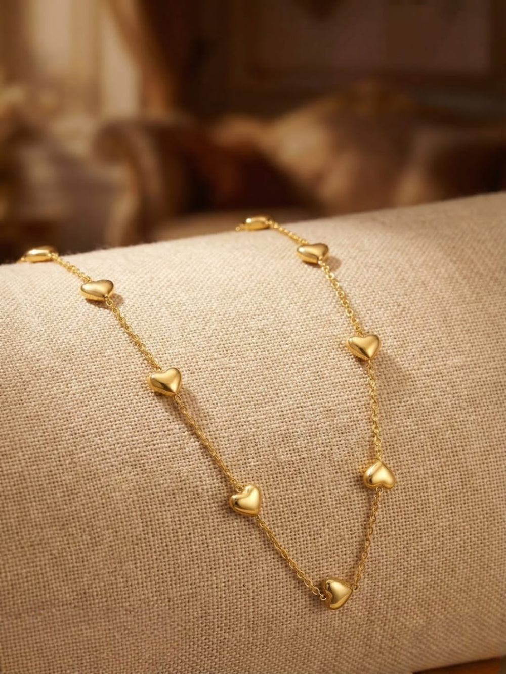 Golden heart charm necklace