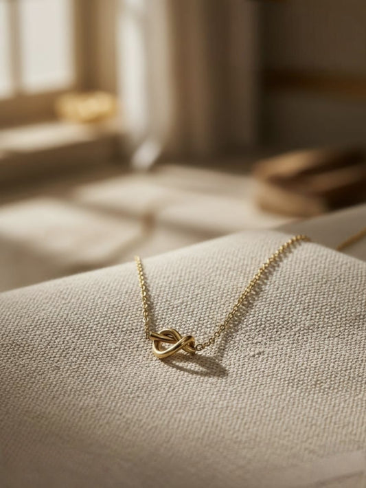 Modern knot style gold necklace